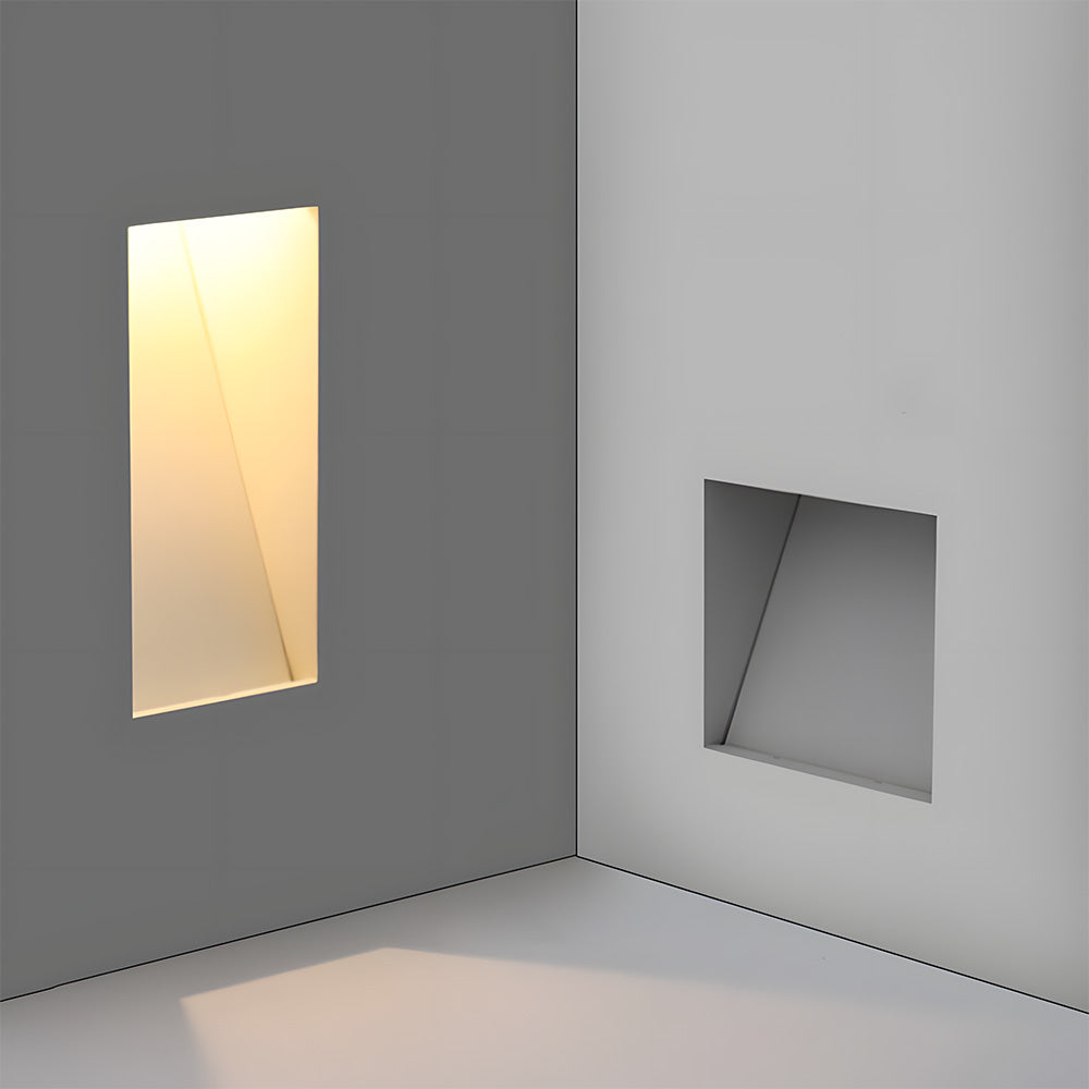 A modern LED wall light with a sleek, minimalist embedded design, perfect for staircases.