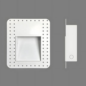 A contemporary LED wall light with embedded design, ideal for modern staircase lighting.