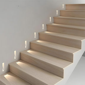 LED wall light with embedded design, perfect for creating a modern, illuminated staircase.
