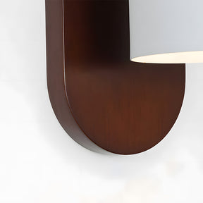 Minimalist solid wood wall light, ideal for modern living spaces.