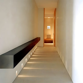 Simple and elegant LED wall light with a frameless design for contemporary spaces.