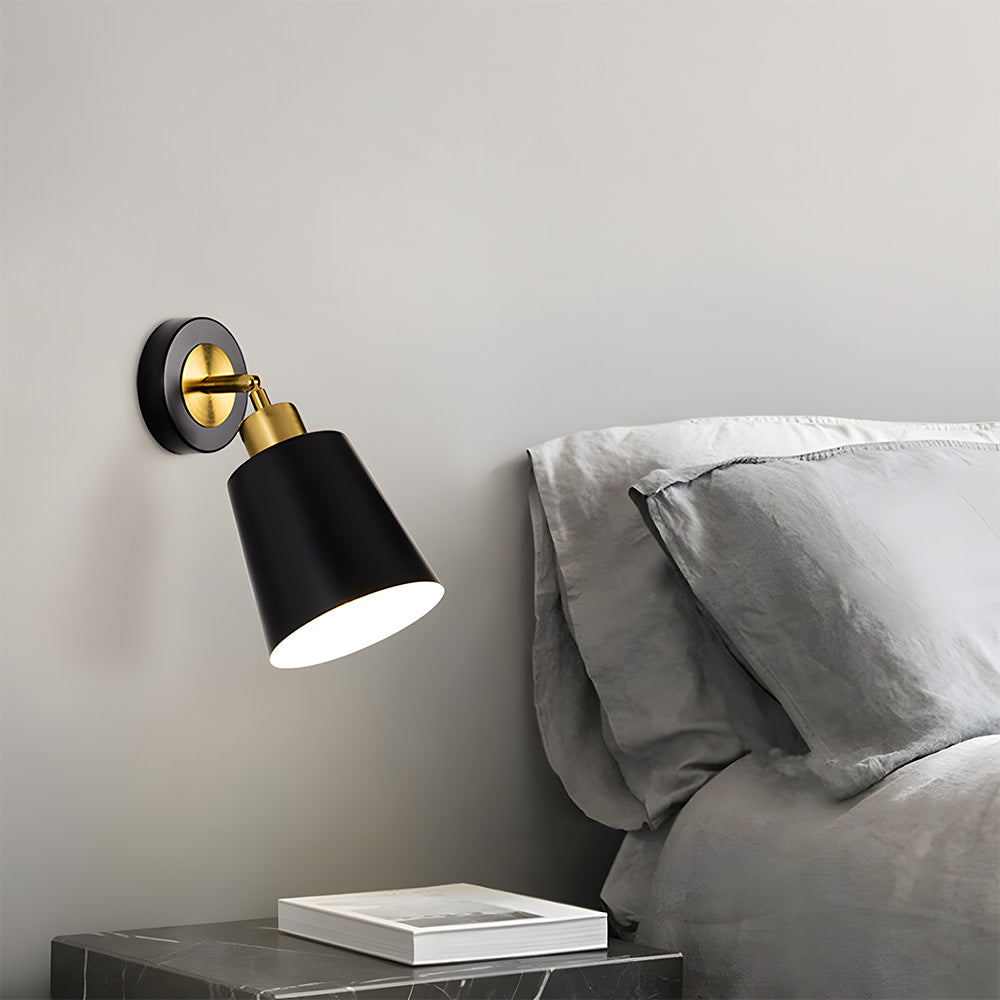 A modern wall light with a sleek design, perfect for bedrooms and living rooms.